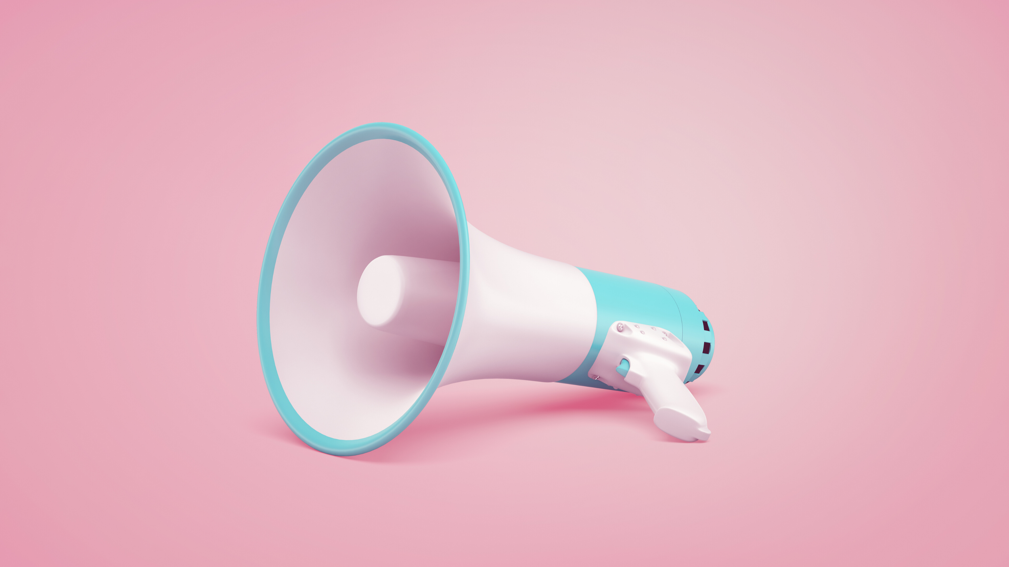 pink background with white and blue megaphone